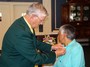 DG Dave Clifton pinning Carole